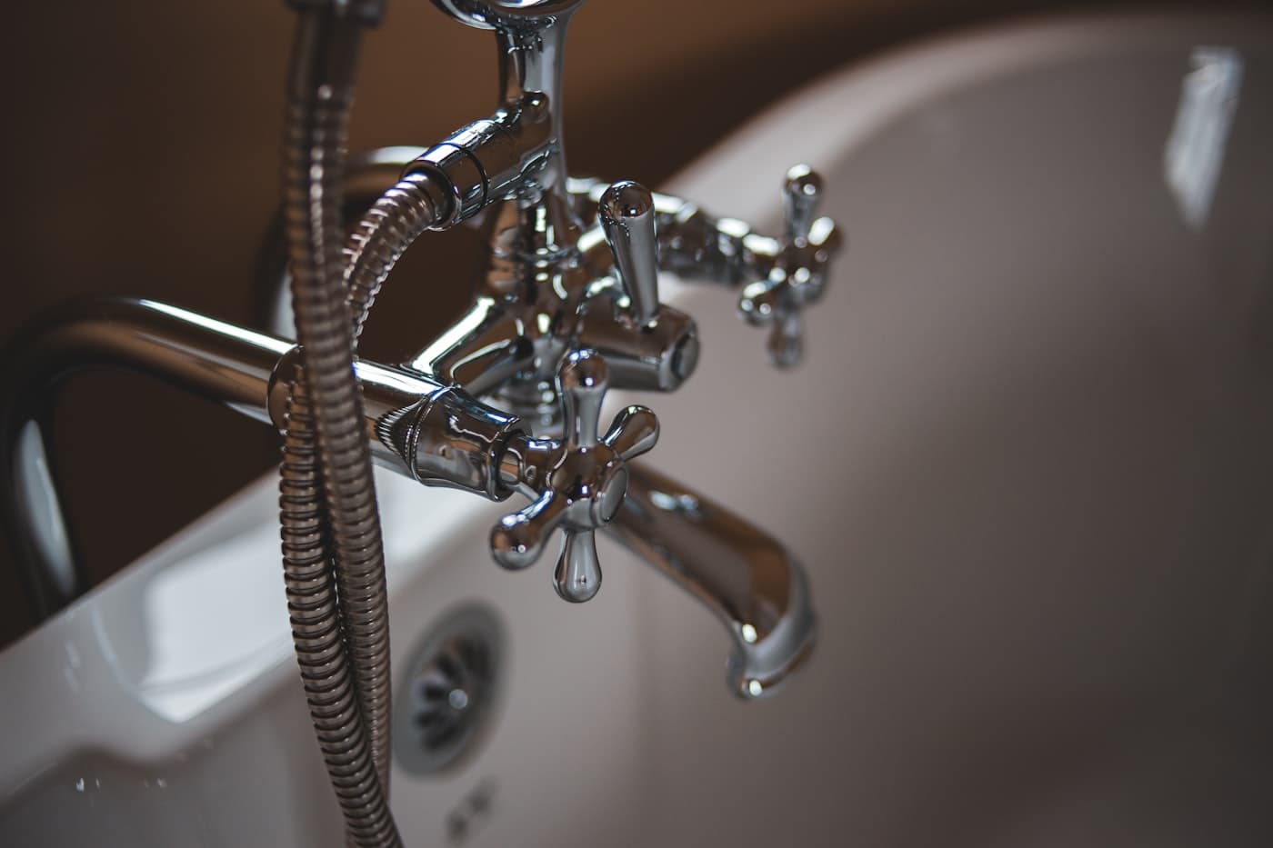 Polished bathtub faucet and fixtures